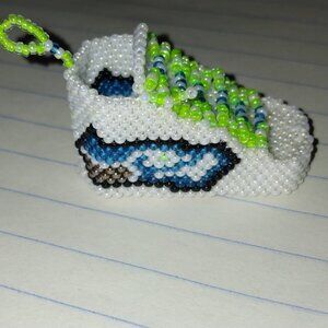 Hand beaded Seahawk key ring shaped as a shoe